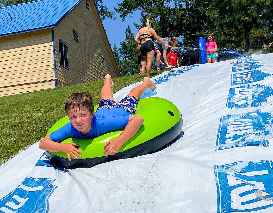 Camper on the slip and slide