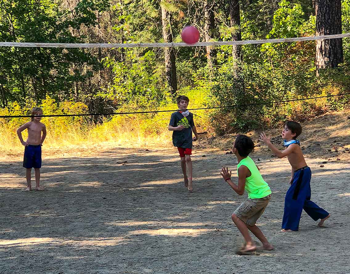 Kids playing volleyball