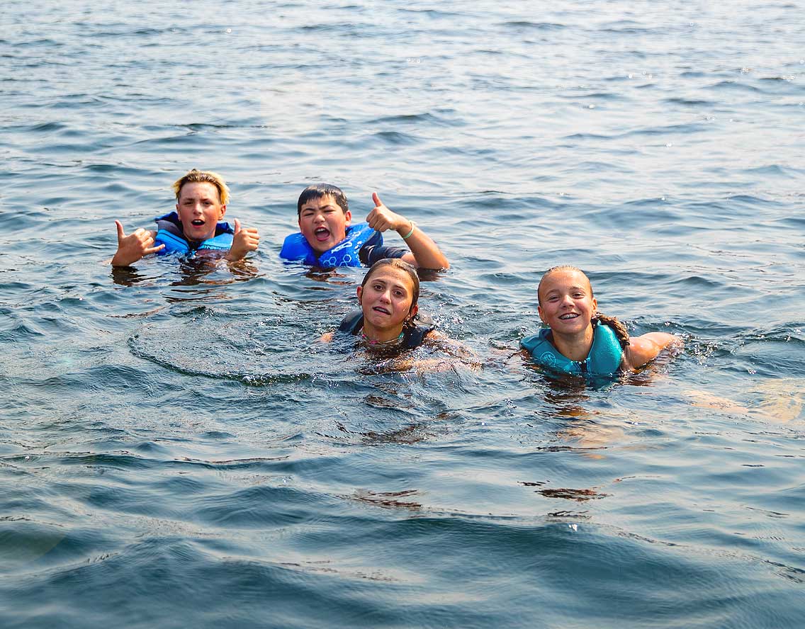 MiddleSchoolWatersportsPhoto3_2021 Middle school campers chilling in the lake